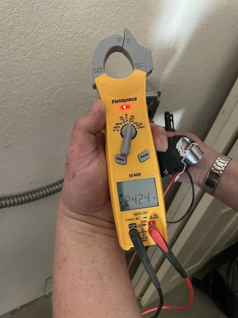 Voltage testing with clamp meter during Aluminum Wiring Replacement in Winchester